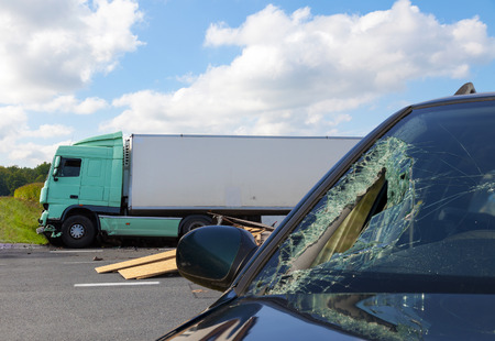 photo of truck in an accident with car